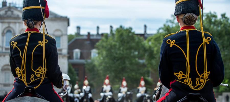 two female cavalry members on horseback at parade