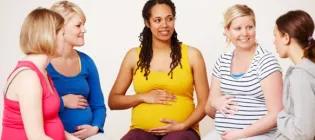 five pregnant mothers discussing their experiences