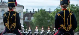 two female cavalry members on horseback at parade
