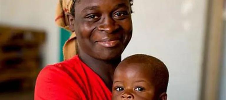 Lady holding a child
