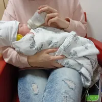 baby being bottle fed