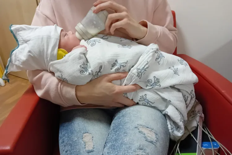 baby being bottle fed